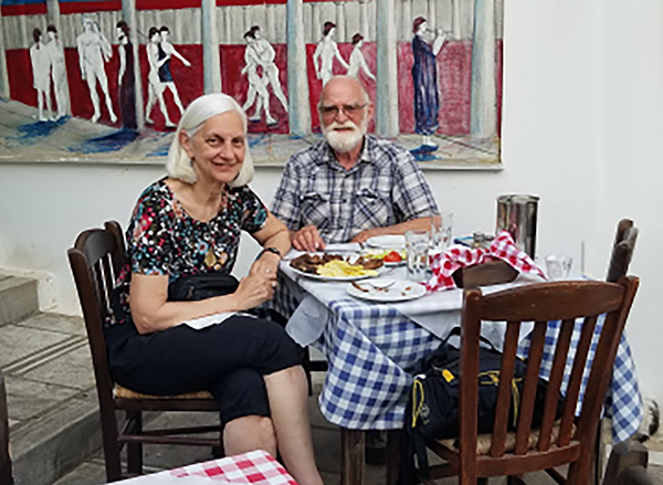 photo of Karl & Emily enjoying a Greek meal