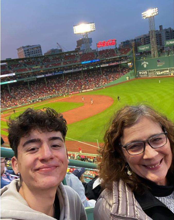 Photo of Santi with Meg Holland at Red Sox baseball game